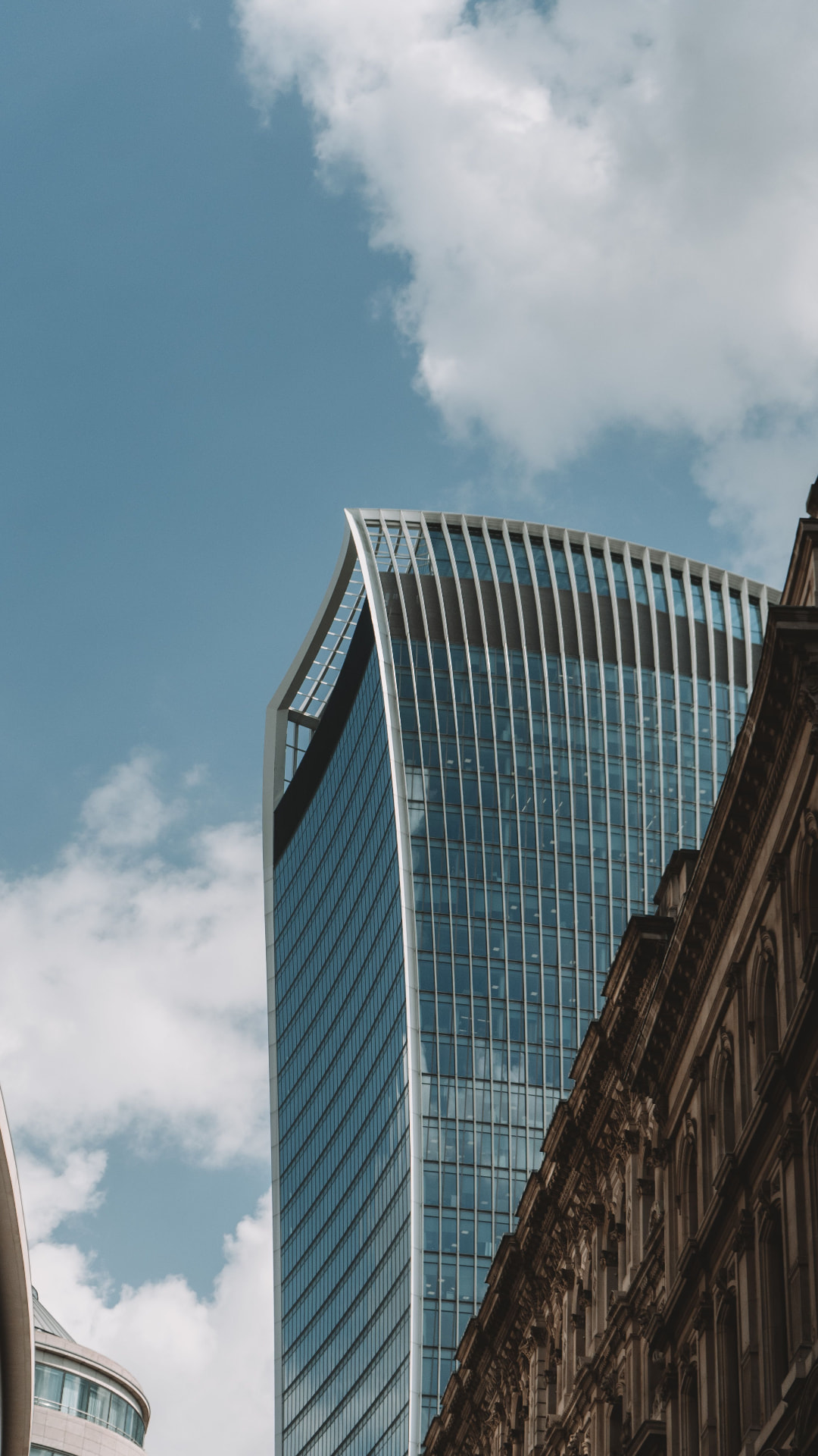 Modern glass banking tower in a city financial district